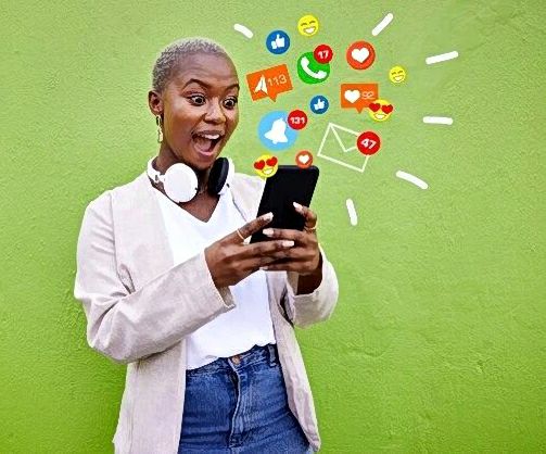 a woman holding a phone