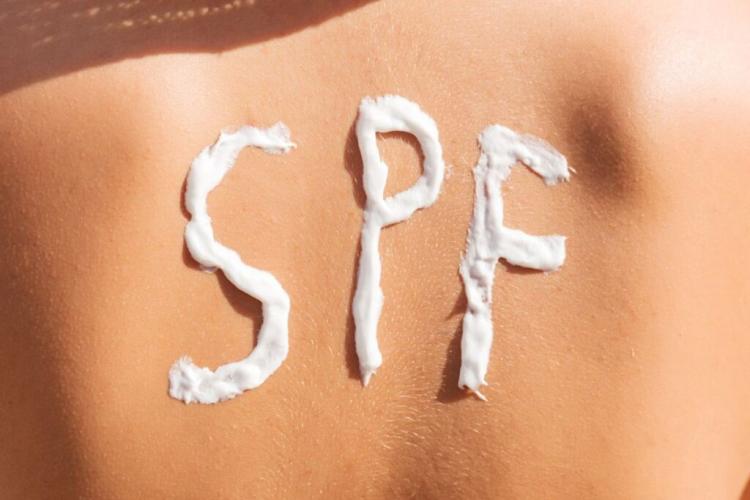 SPF written on the back of someone